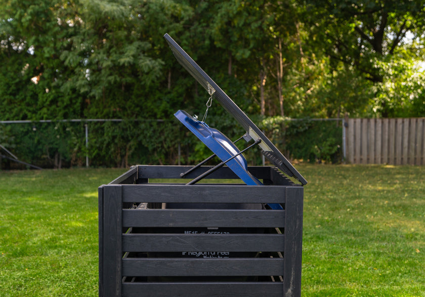 side view of Critter-proof single garbage bin shed built with sustainable composite plastic and a reinforced aluminum frame